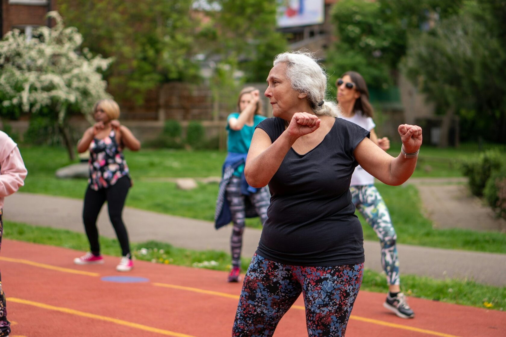 Diverse adults exercising together