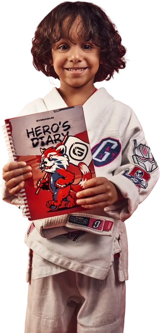 Young athlete holding a Hero’s Diary journal