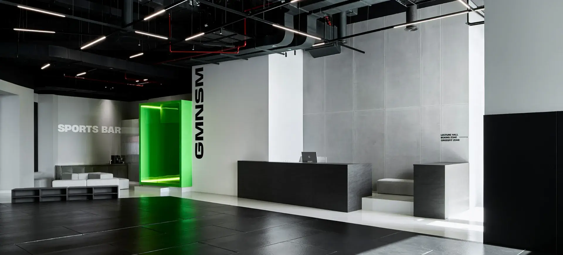 GMNSM training facility interior with branded reception area