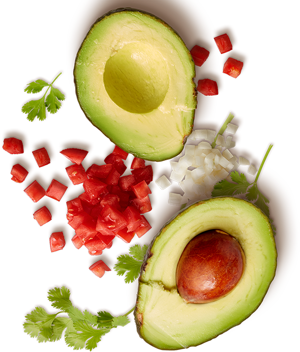 Разрезанный авокадо, нарезанные помидоры, чеснок и петрушка. Купить правильное питание в Харькове