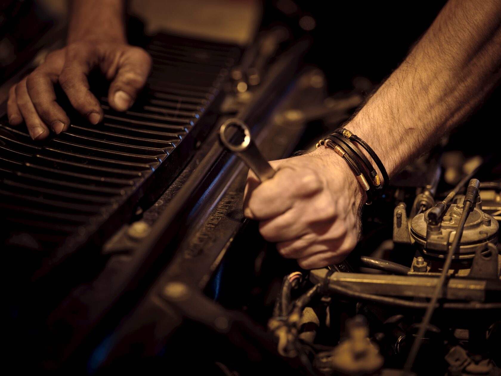 Mechanic working on diesel truck engine repair