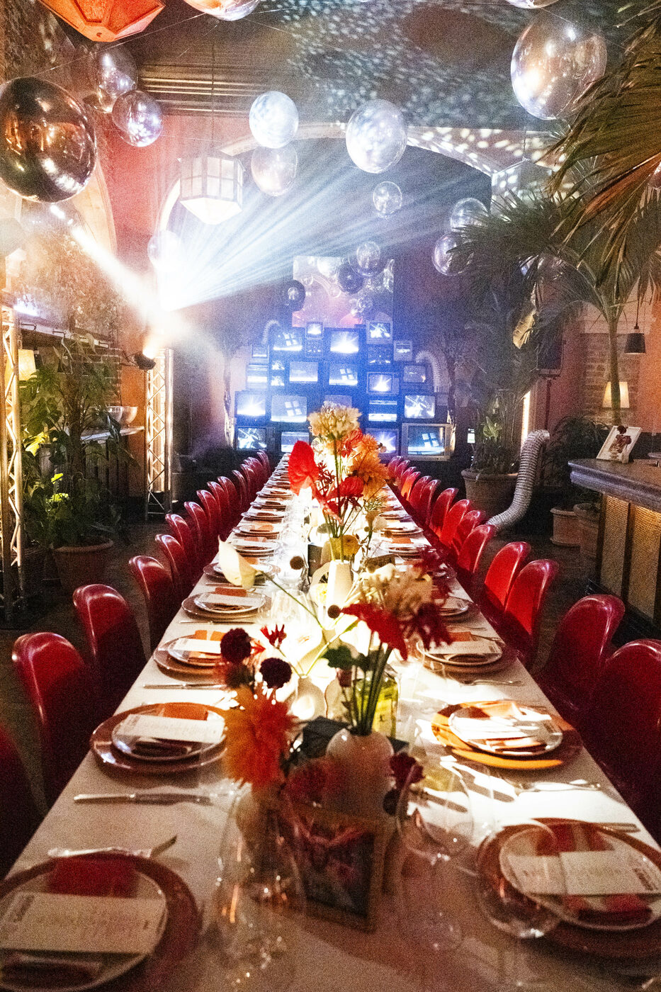 A retro space dinner setting with retro TV's on the background, Belvedere Restaurant, London