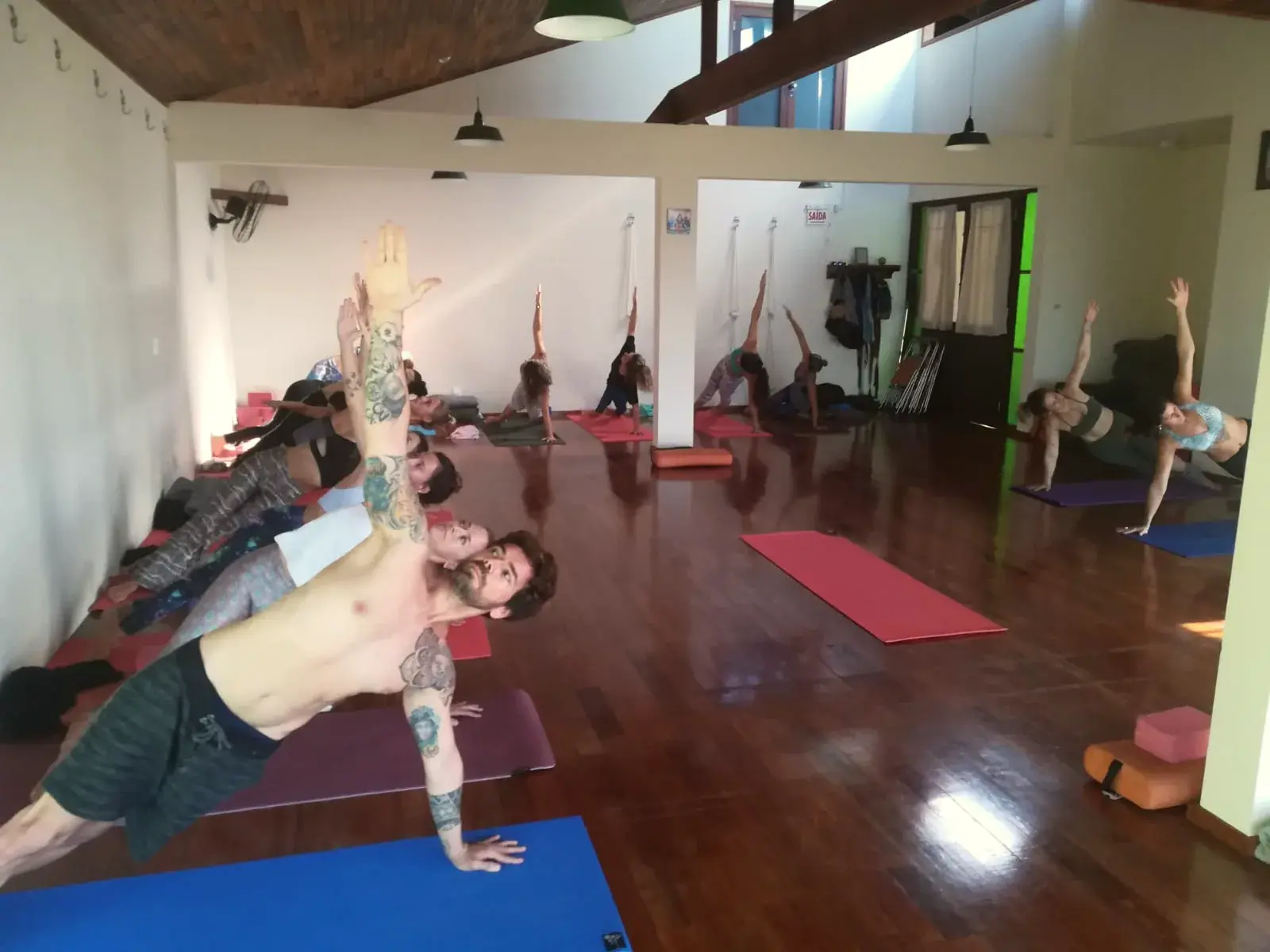 Group yoga class led by Radha