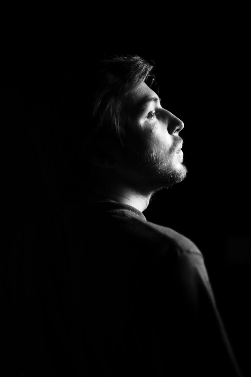 Profile black and white portrait of a young man