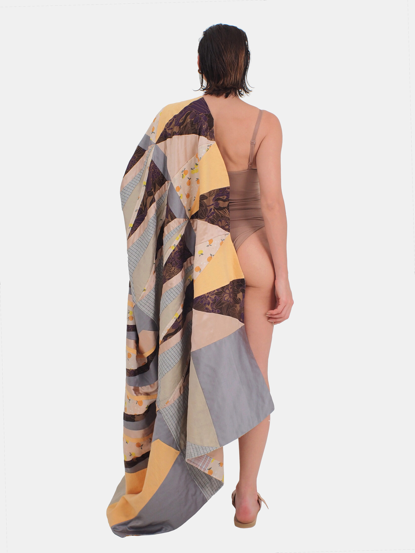 light airy hand quilted pool blanket made of cotton, silk and viscose. can also be worn as pareo or sarong