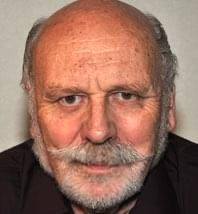 elderly gray-haired man with a mustache