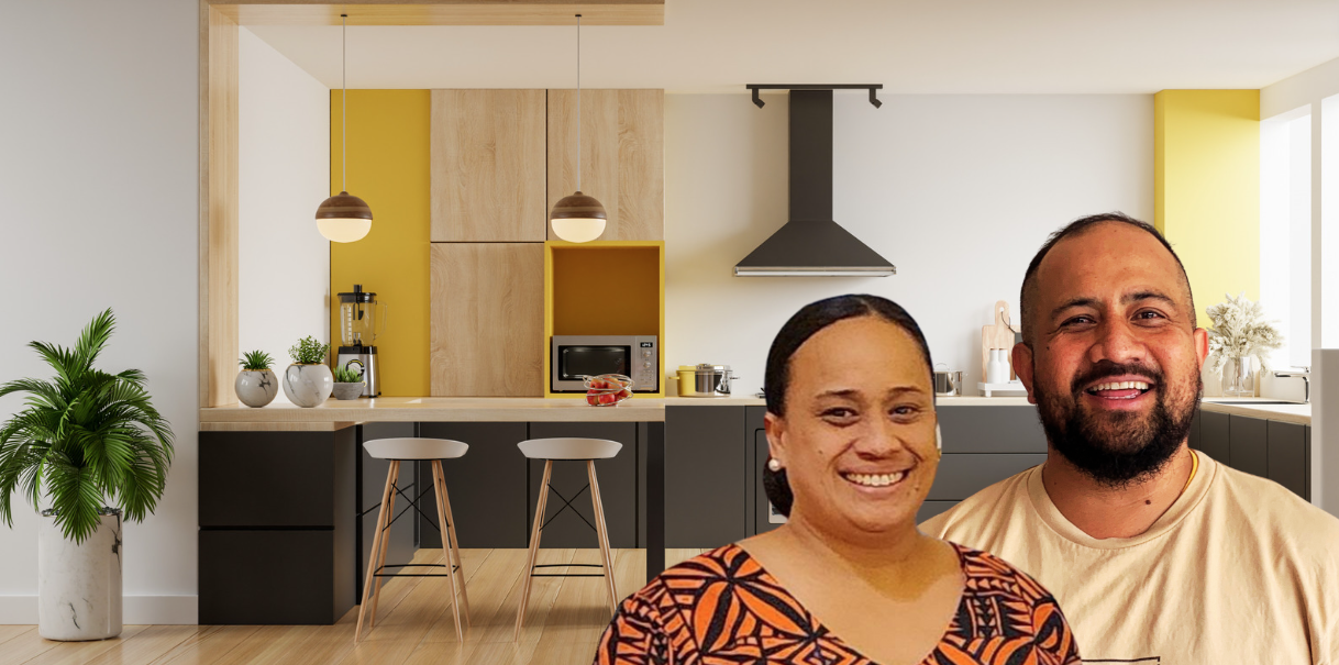 A Pacific Island male and female cleaners in front of a modern kitchen.