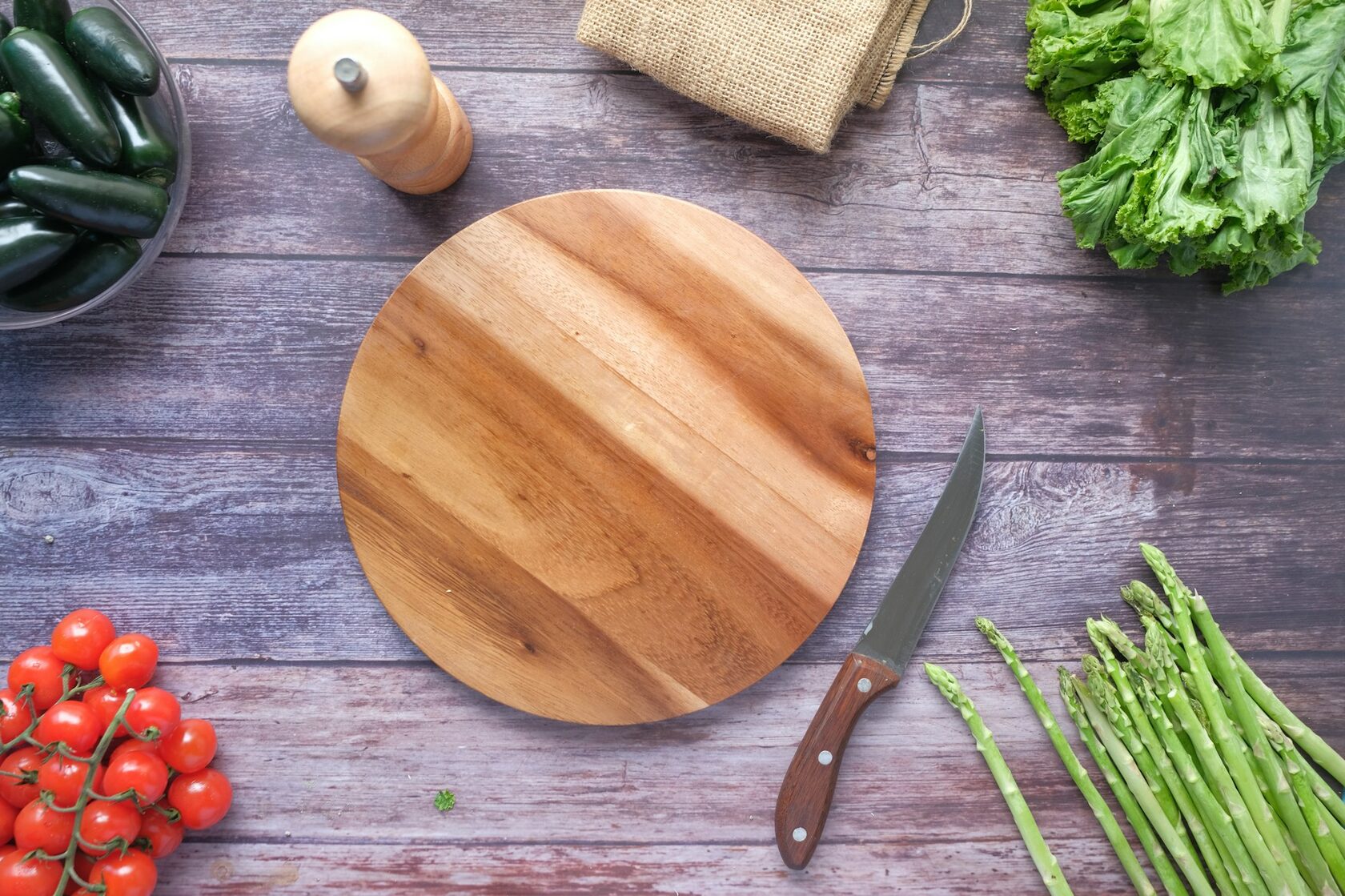 Fresh seasonal ingredients arranged on a wooden board