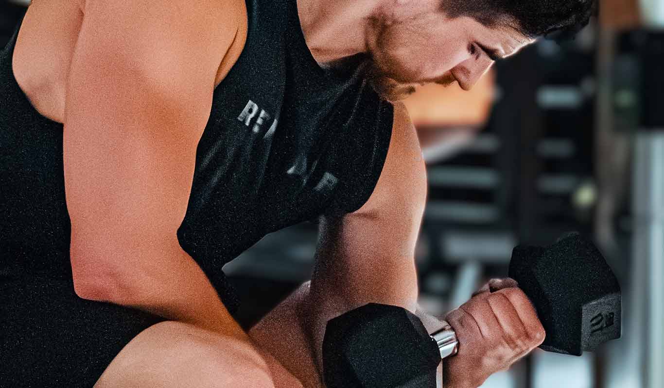 Strength training with dumbbells at Makanda’s gym