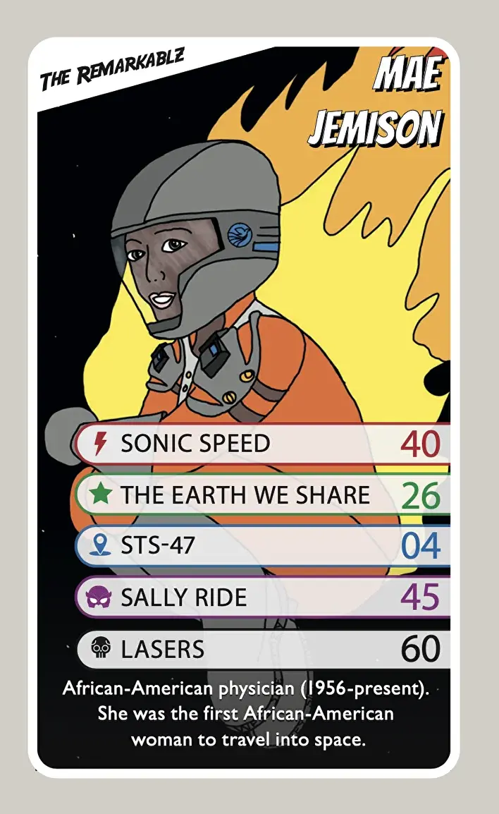 A comic-style playing card of Mae Jemison in a spacesuit, flying through space with flames behind her. The card lists her stats including “Sonic Speed,” “The Earth We Share,” “STS-47,” “Sally Ride,” and “Lasers.” Text at the bottom reads: “African-American physician (1956–present). She was the first African-American woman to travel into space.”