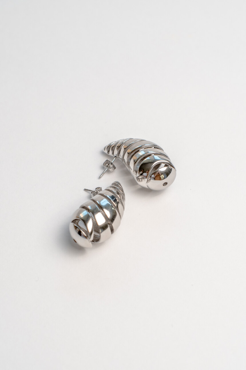 Jewellery product photography of silver earrings