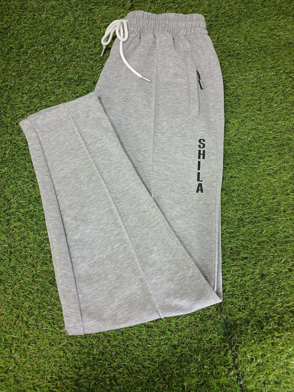 Чоловічі сірі спортивні штани зі стрілкою