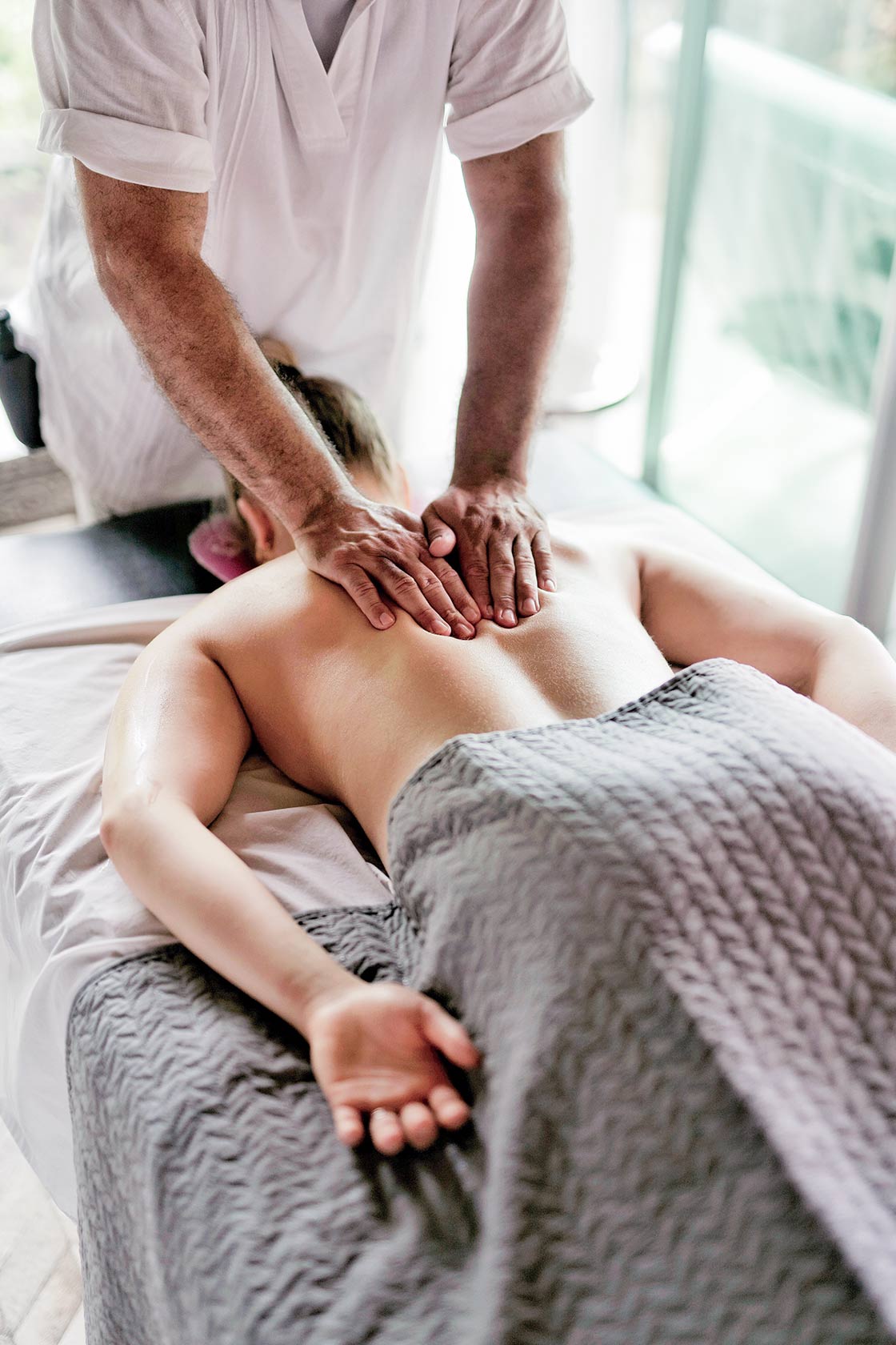 Deep tissue massage at Shanti Spa — the therapist’s hands at work