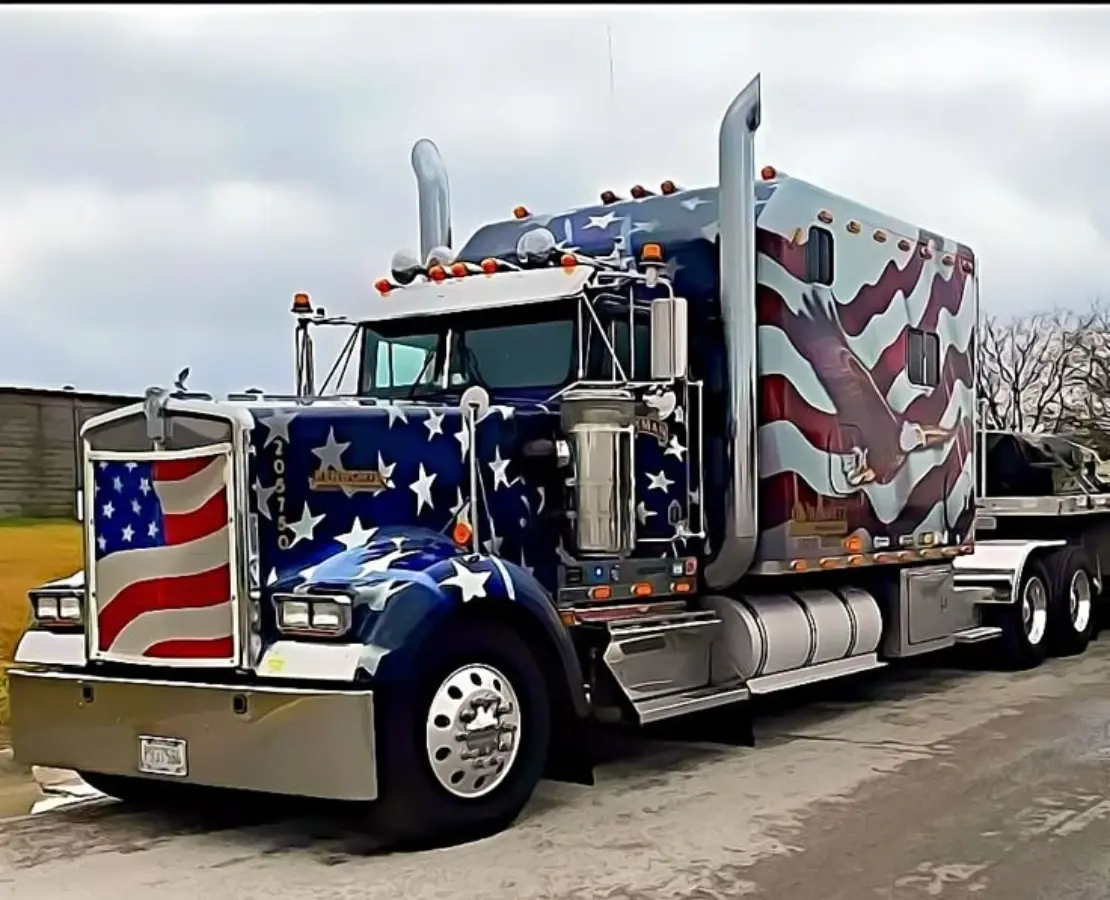 CDL-A truck driver driving a semi truck on a US interstate highway