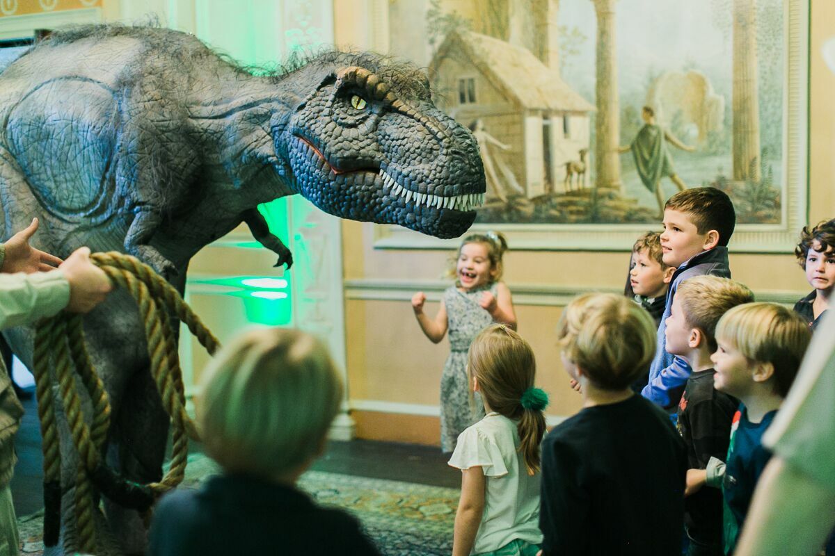 A party singer and a band on cabaret stage during the moulin rouge themed party at Hotel Cafe Royal, London