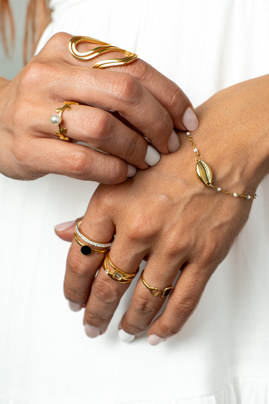 Gold rings on female hands