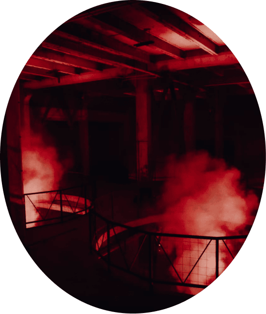  two hatches in the floor from which smoke comes out