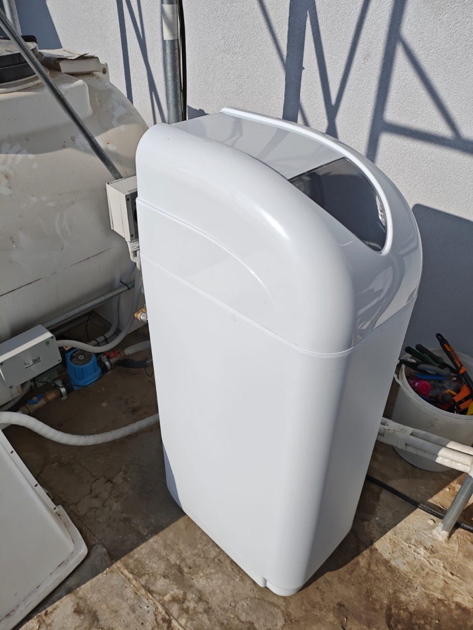Water softening unit connected to the water tank on a typical Cypriot taratsa.