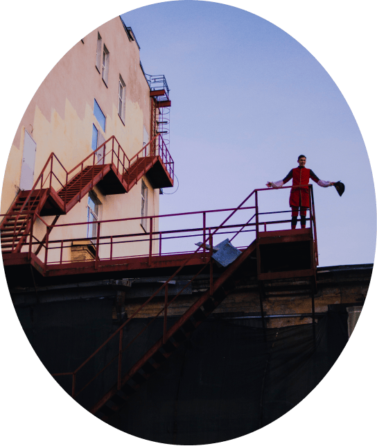  the actor stands on the roof