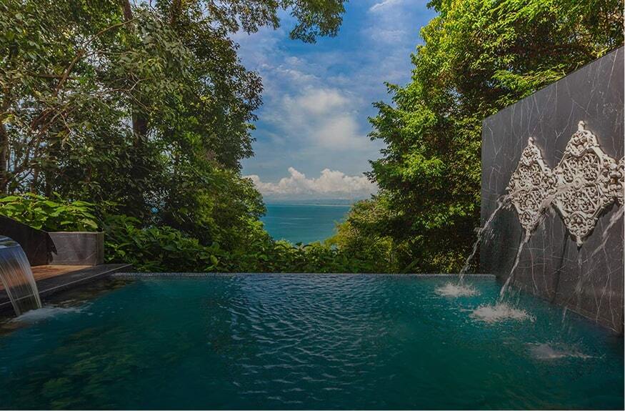 Private infinity pool with a waterfall wall and ocean view — seasonal offers at Makanda