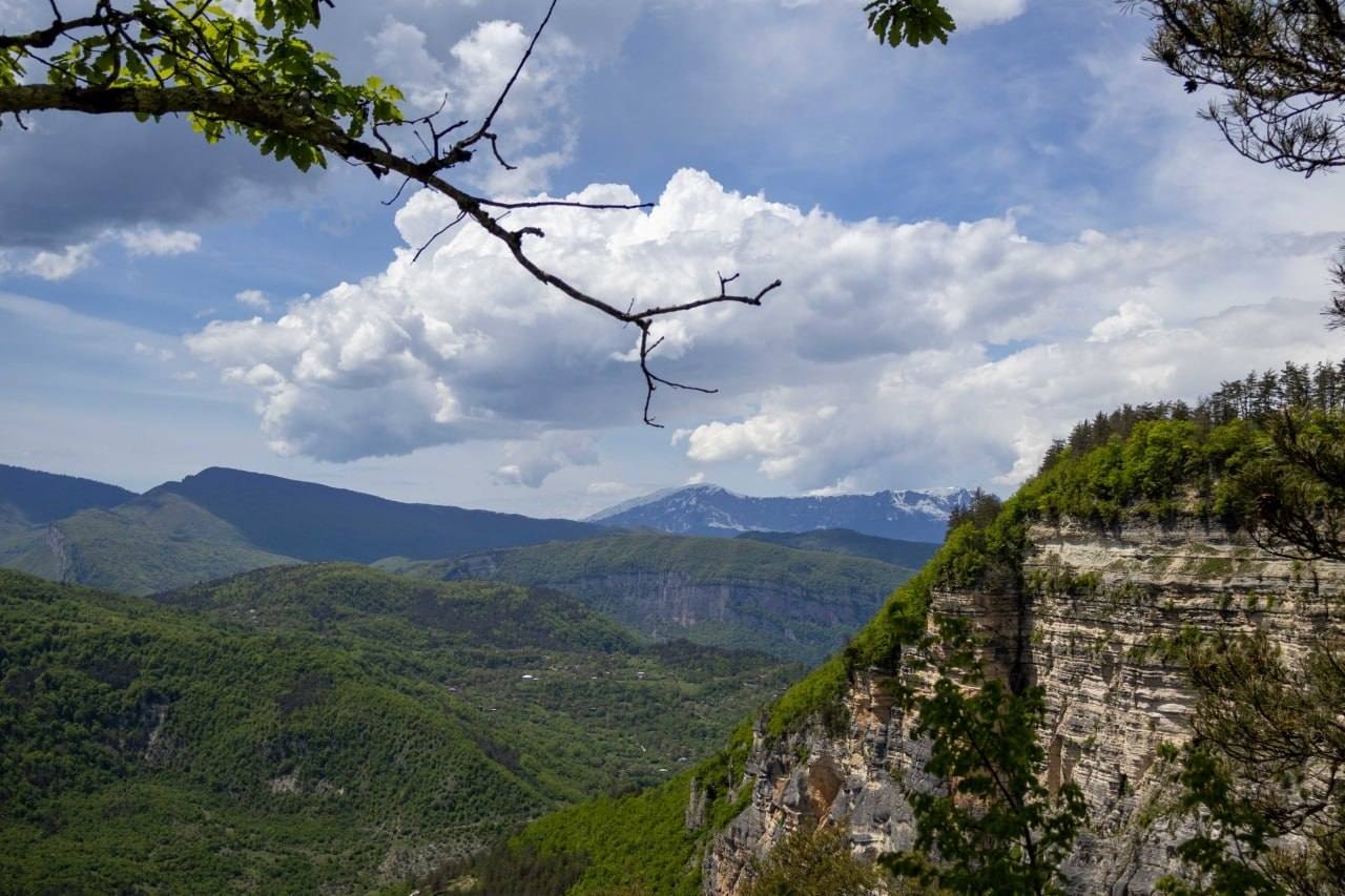 The forested mountains and cliffs of Rachi