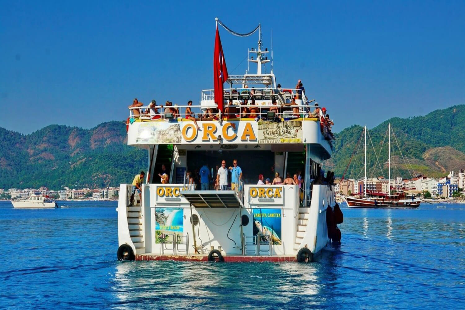 Паром из мармариса на родос. Паромы в мармарис. Остров родос катамаран экскурсия. Катамаран принц трабзон. Родос из мармариса.