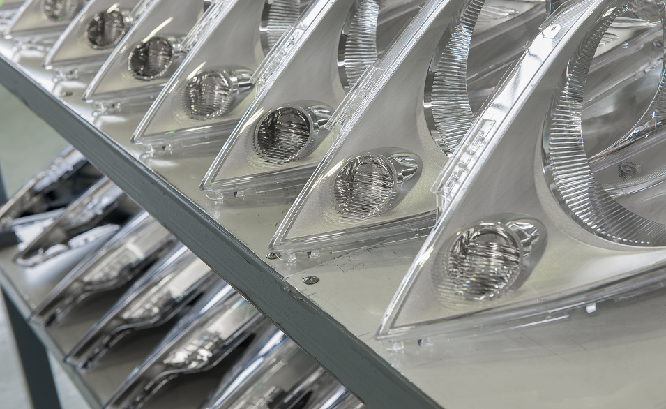 Reflective headlight lenses in production