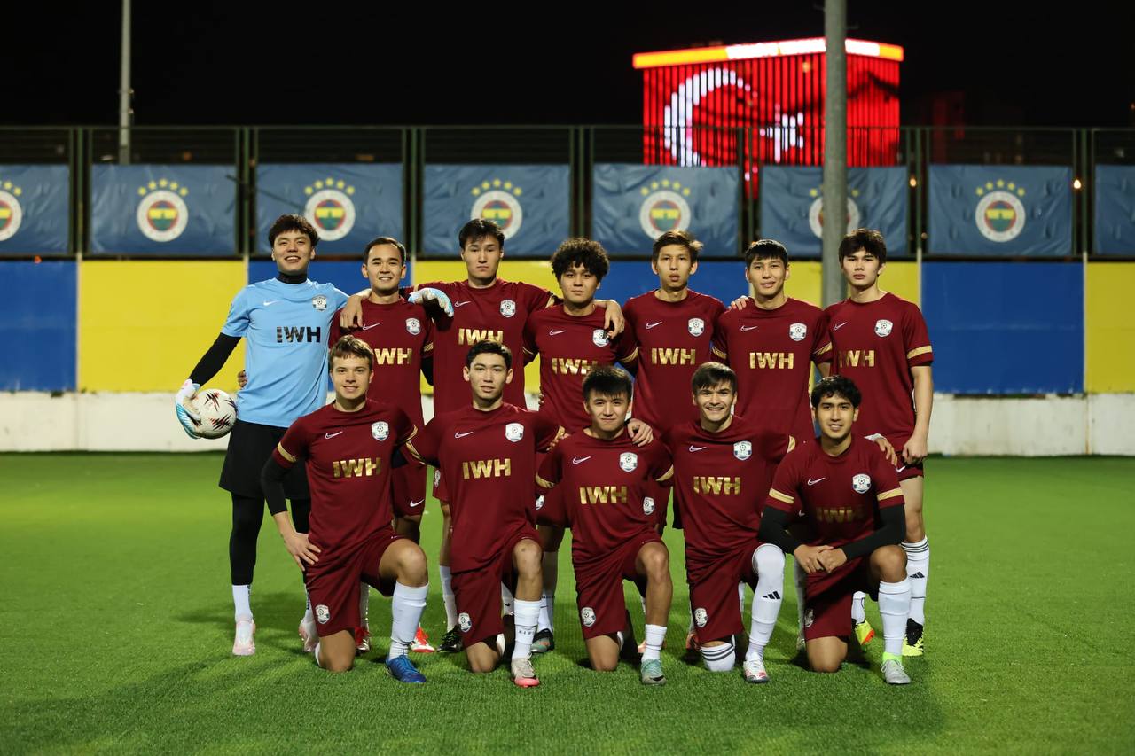 FC MIX football team in IWH jerseys at Fenerbahçe's reserve ground in Istanbul