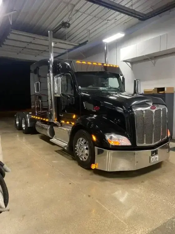 CDL-A truck driver operating a semi truck on US highway