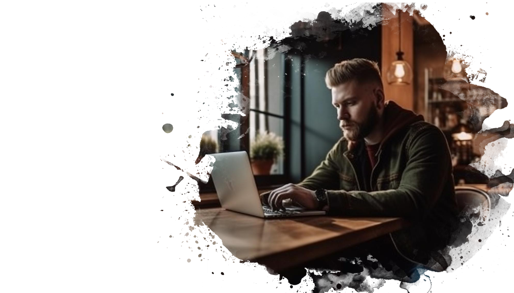 Молодой человек работающий за ноутбуком