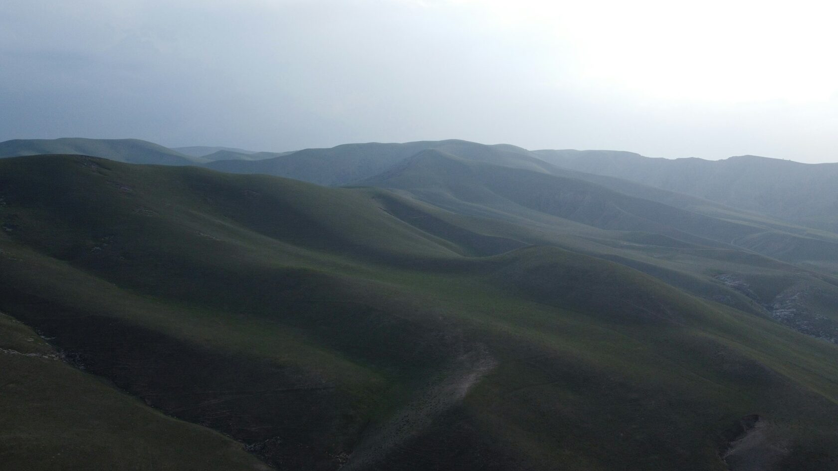 Green mountain slopes of the Chon Kemin Valley