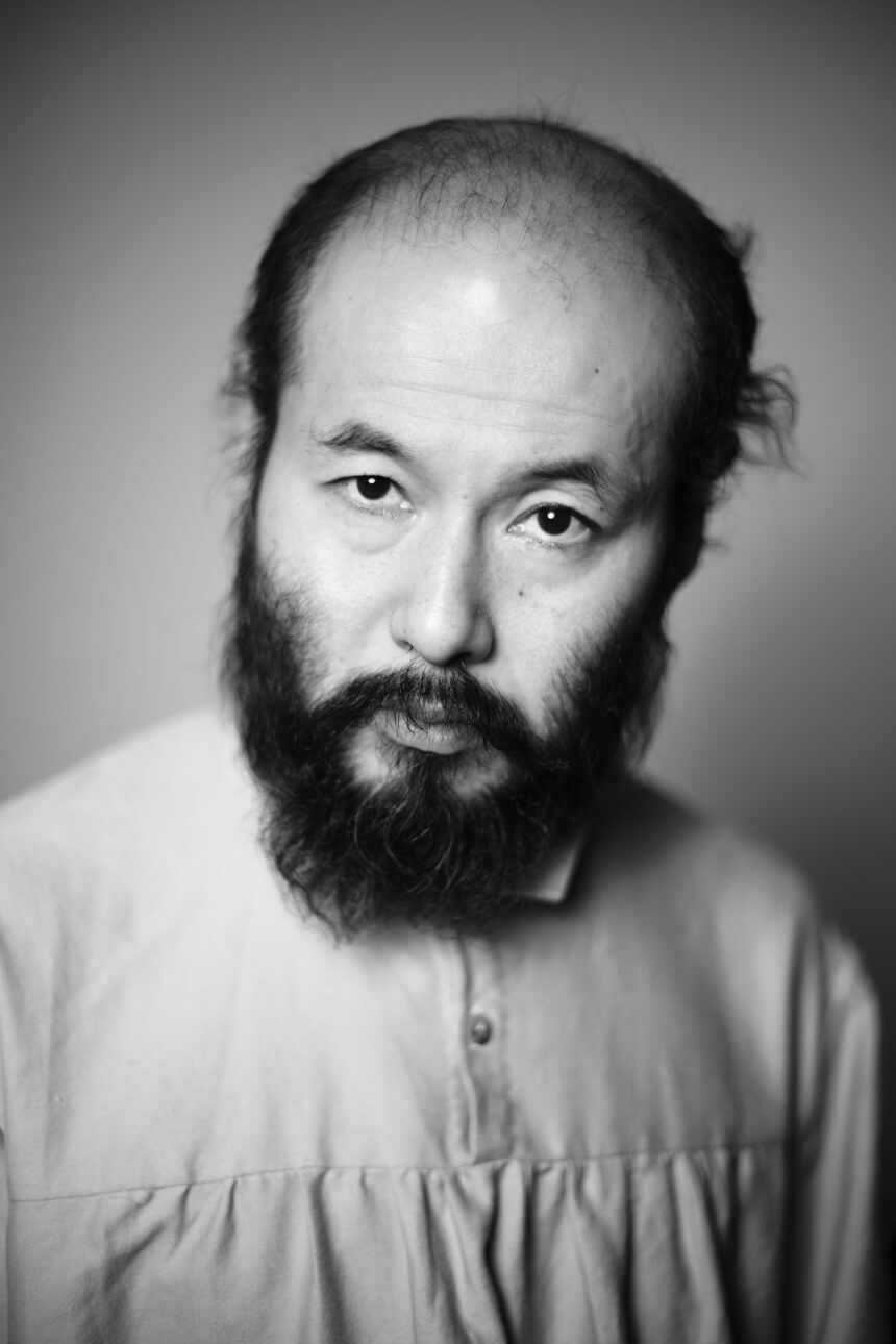 Vintage style black and white portrait of an older asian man