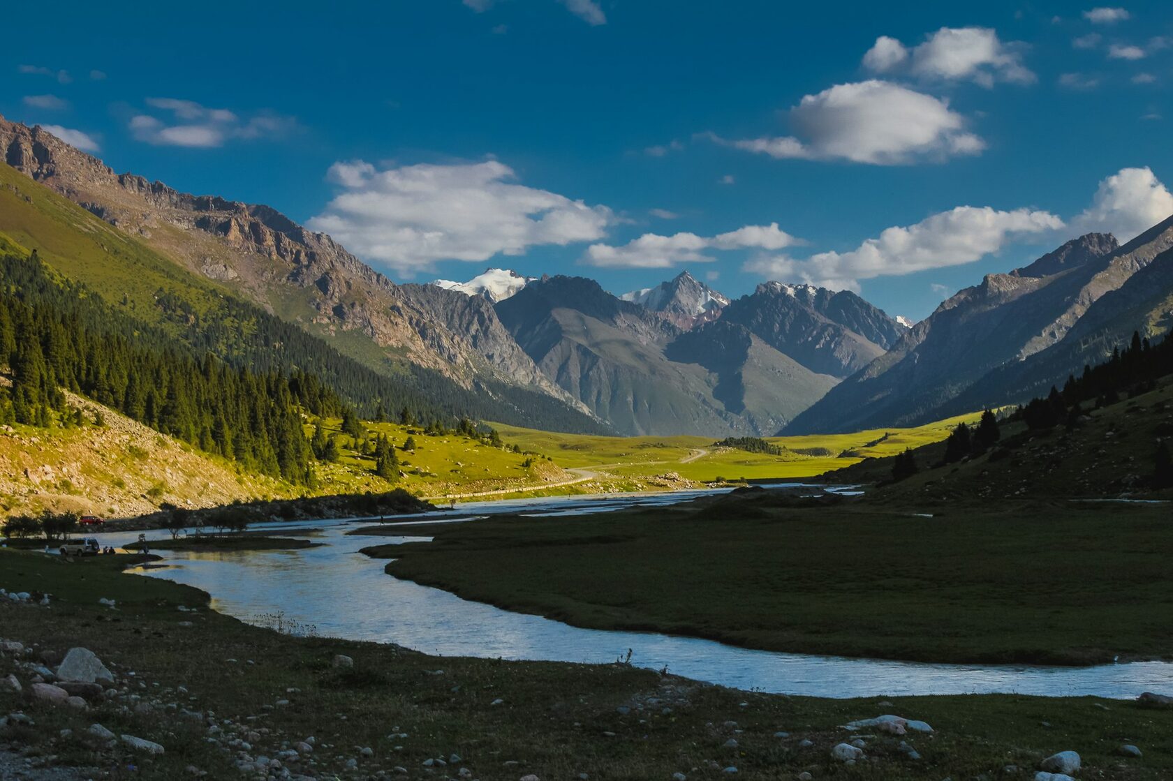 Green valley and mountains of the Tian Shan range in Kyrgyzstan