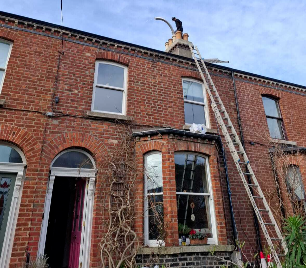 Chimney inspection on roof