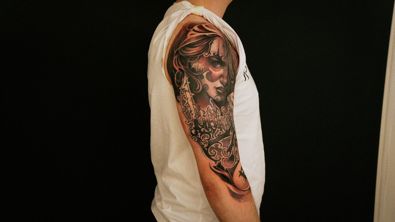 Symbolic figurative portrait tattoo